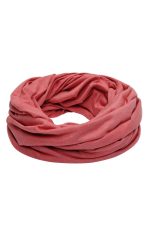 A loop scarf in a soft coral colour, featuring a gathered, textured design. The scarf has a logo printed on it.