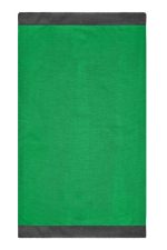 A green scarf with a dark grey border, featuring a logo at the edge.