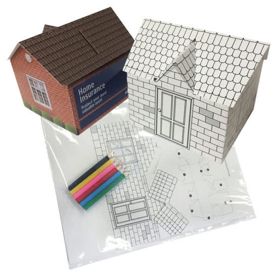 A house-shaped money box kit featuring a printable design, markers in assorted colours, and a self-assembly template. A house-shaped money box kit featuring a printable design, markers in assorted colours, and a self-assembly template.