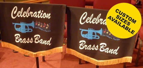 Two black music stand covers with decorative fringes, featuring blue trumpet illustrations and a logo. Music Stand Covers - Image 1