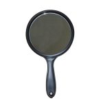 A double-sided mirror with a black handle and a circular reflective surface.