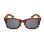Wood-like sunglasses featuring dark lenses and a textured brown frame. Includes a logo on the side.