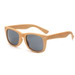 Wood-like sunglasses featuring a light brown frame and dark lenses, with a logo on the side.
