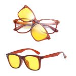 A pair of Polaroid sunglasses in a reddish-brown frame with yellow lenses, featuring a logo on the side.