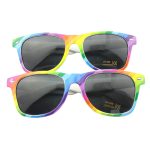 Rainbow sunglasses featuring a vibrant multi-coloured frame with grey lenses, stacked in pairs. Includes a logo on the side.