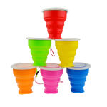 A stack of six collapsible silicone travel cups in red, green, yellow, orange, pink, and blue, featuring lids and a logo.