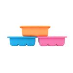 Three silicone ice cube trays in orange, blue, and pink stacked together. Each tray has a unique shape and features a logo.
