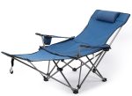 A blue camping lounge chair with a reclining design, armrest, and a small headrest pillow. It has a logo on the frame.