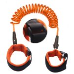 An orange coiled strap with two black wristbands. Each wristband features a fastening mechanism.