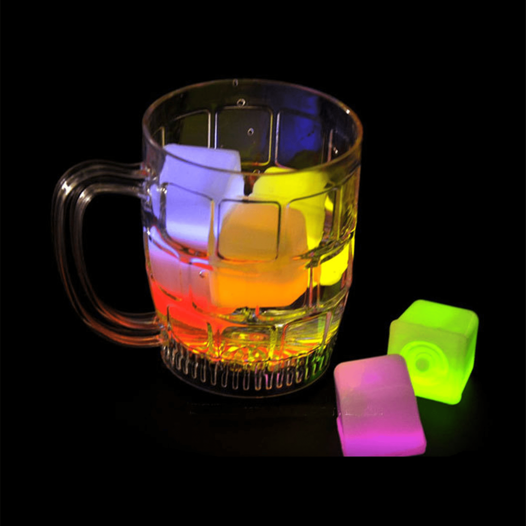 A clear drink mug with glowing ice cubes in purple, blue, and green shades, resting on a dark surface. A clear drink mug with glowing ice cubes in purple, blue, and green shades, resting on a dark surface.