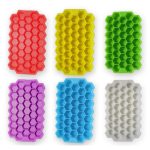 A set of silicone ice cube trays in vibrant colours: red, yellow, green, purple, blue, and white, featuring a hexagonal shape.