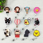 A collection of colourful badge holder clips featuring various cute and playful designs, including animals and food items.