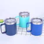 Three double wall stainless steel vacuum insulated mugs in navy, teal, and blue, each with a transparent lid and handle.