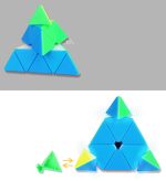 A triangular cube made of blue and green pieces, stacked in a pyramid shape. It features a playful, modular design.