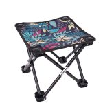 A folding stool with a floral pattern seat and a black metal frame, featuring a compact design for easy portability.