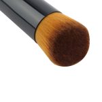A single makeup brush with a round, soft bristle head and a sleek black handle.
