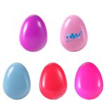 An egg-shaped comb in pink, purple, blue, red, and pink, featuring a logo on one of the combs.