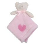 A soft pink baby blanket featuring a teddy bear head and a heart motif, with a ribbon on the bear's neck.