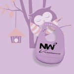 A lavender silicone baby bib with a round neck and a logo, set against a pastel background with a cartoon owl.