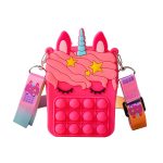 A pink unicorn-shaped bag with a pop fidget design and colourful straps featuring playful decorations.