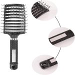 A black paddle hair brush with a textured handle and flexible bristles, featuring a logo on the handle.