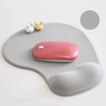 A grey office mousepad with a pink mouse and two small decorative figures. Features a wrist rest section.