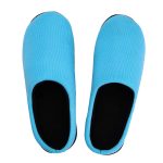 Two-tone blue memory foam slippers with a soft black interior, featuring a simple design and a flexible sole.