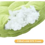 A round green seat cushion filled with EPE foam, featuring a textured surface and visible inner filling.