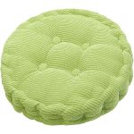 A round seat cushion in a light green colour with a textured, quilted surface and button detailing.