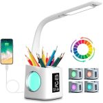A white study LED desk lamp with a USB charging port, featuring a clock and a holder for colourful pencils.