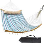 A double hammock swing features quilted fabric in blue and white stripes, with a beige headrest and a carrying bag.