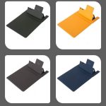 A multi-function mouse pad with wireless charging in black, green, yellow, and navy blue. Features a logo.