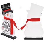 A festive white snowman ornament with a black hat and red scarf, featuring a countdown calendar and snowflake detail.