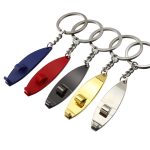 A surfboard-shaped keychain set featuring red, blue, silver, gold, and black finishes, with metal keyring attachments.