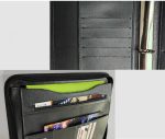 A black ring binder featuring multiple card slots, a flat pocket, and a metallic ring mechanism.