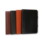 A collection of four Conference Ring Portfolios in brown, green, orange, and black, featuring sleek leather textures and a logo.