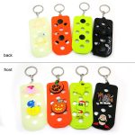 A collection of colourful Clog Charm Keychains, featuring various designs and characters on both sides, including orange, green, and black.