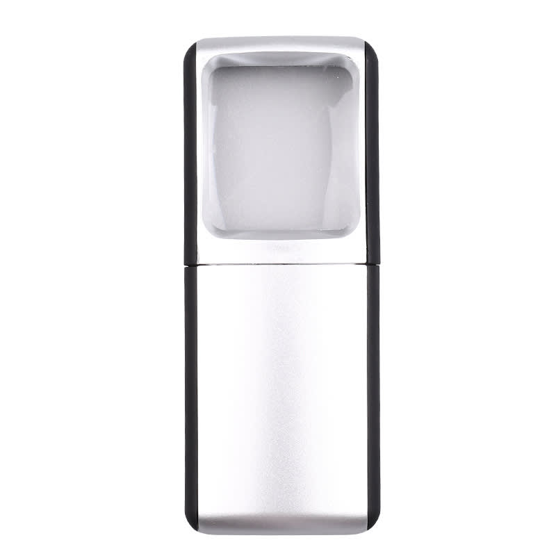 A silver and black slide-out magnifier with light, featuring a clear magnifying lens and compact design. A silver and black slide-out magnifier with light, featuring a clear magnifying lens and compact design.