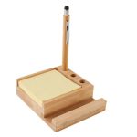 A bamboo desk organiser with a pen holder and space for sticky notes, featuring a logo on the front.