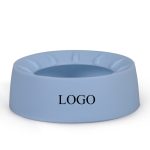 A drink bottle coaster in light blue featuring a circular shape and an indented design with a logo.