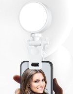 A white conferencing lighting kit with a circular light attached to a phone holder, designed for enhanced lighting.