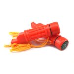 A survival tube set in bright orange, featuring a whistle and a compass, both attached with yellow cords.