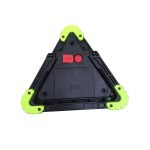 A multifunctional triangular car tool with bright green rubber corners and a central red button. It features a logo.