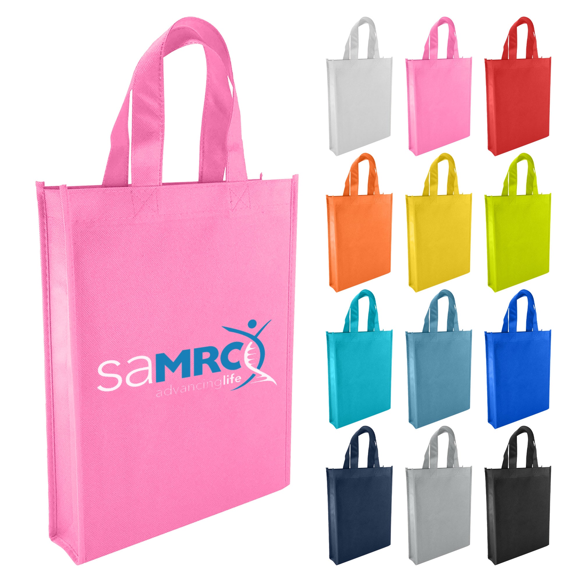 A pink non-woven tote bag with handles and a logo, surrounded by various coloured tote bags. Non Woven Trade Show Bag - Image 1
