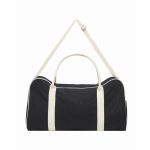 A black and cream two-tone canvas duffle bag with a shoulder strap and dual handles, featuring a logo.