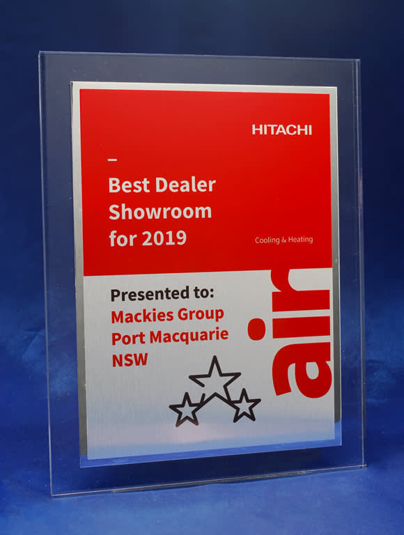 A clear acrylic plaque with a brushed metal plate, shiny border, and red accents, featuring a logo and text. Clear Acrylic Printed Plaque with Brushed Metal Plate and Shiny Border - Image 1