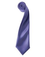 A purple satin tie rolled neatly, featuring a smooth finish and a pointed tip. It includes a logo.