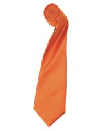 An orange satin tie rolled up neatly, showcasing its smooth texture and vibrant colour. It includes a logo.