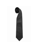 A black fashion tie rolled neatly, featuring a sleek design and a narrow end.