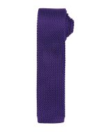 A slim knitted tie in a rich purple hue, featuring a textured design and a branding logo.